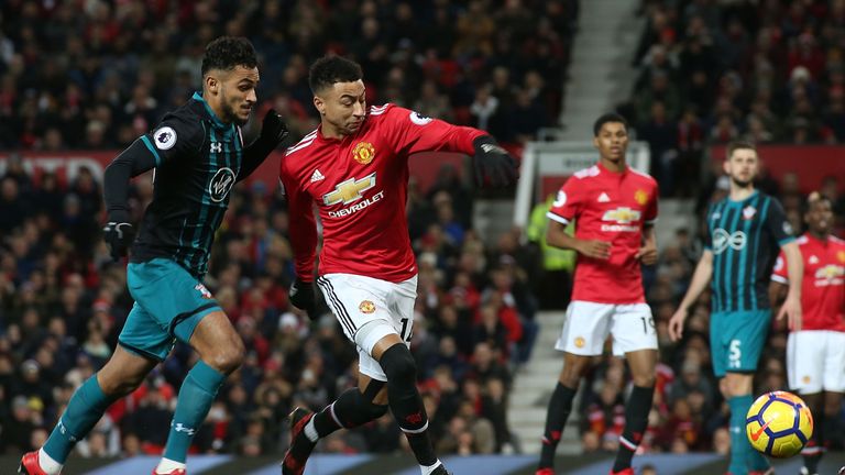 Jesse Lingard under pressure from Sofiane Boufal during the Premier League match between Manchester United and Southampton at Old Trafford