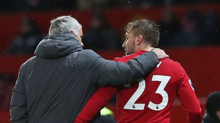 Jose Mourinho embraces Luke Shaw after taking him off at Old Trafford