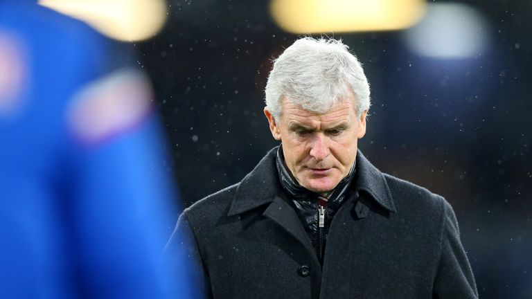 Mark Hughes looks dejected following the 1-0 loss to Burnley at Turf Moor 