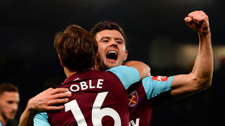 Mark Noble celebrates his goal with Aaron Cresswell