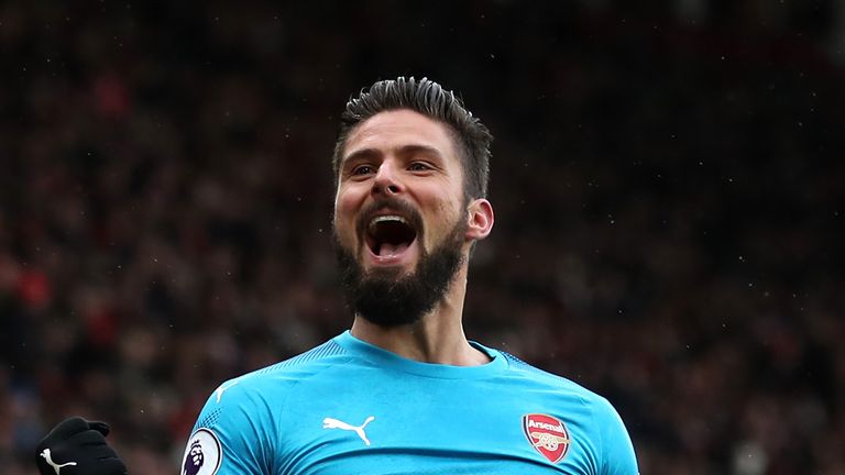 Olivier Giroud celebrates his late equaliser