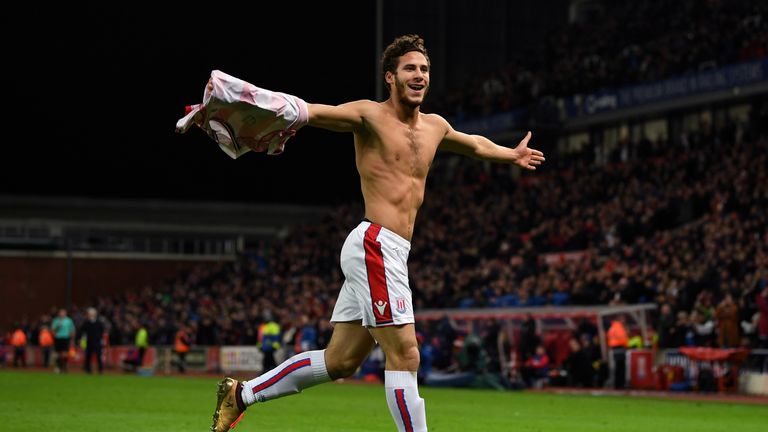 A shirtless Ramadan Sobhi celebrates after scoring Stoke's third goal at home to West Brom