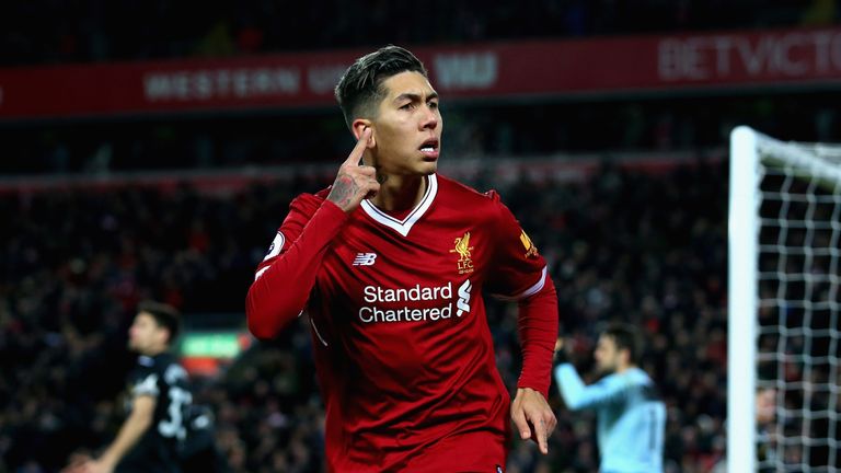 Roberto Firmino celebrates after scoring his Liverpool's second goal