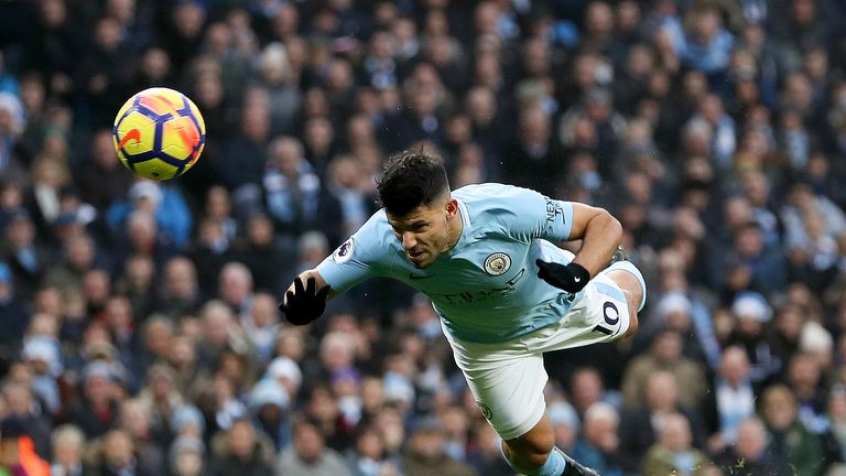 Sergio Aguero makes it 1-0 with a diving header