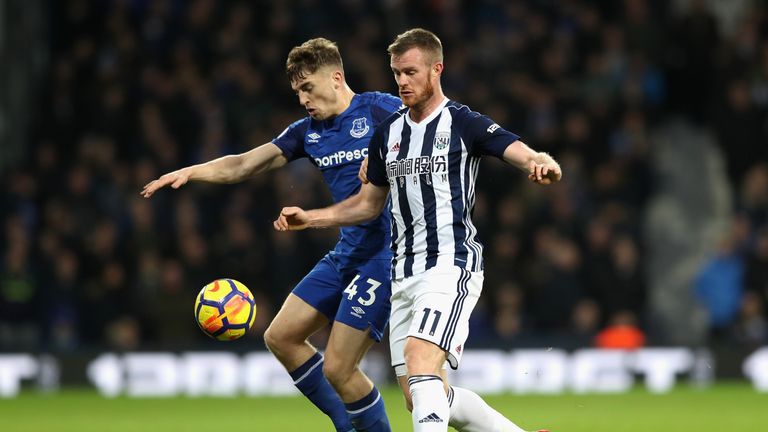 Everton's Jonjoe Kenny is put under pressure by West Brom's Chris Brunt