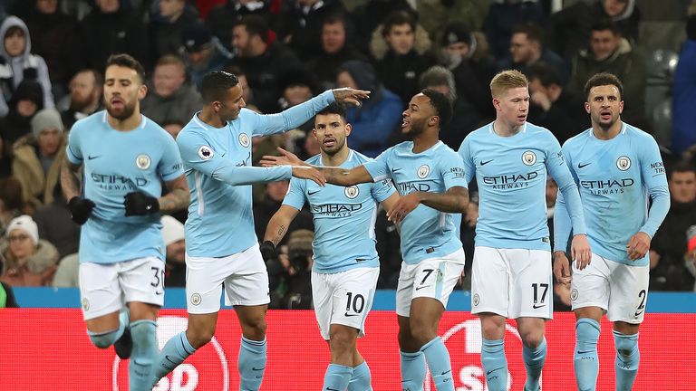 Raheem Sterling celebrates with his team-mates