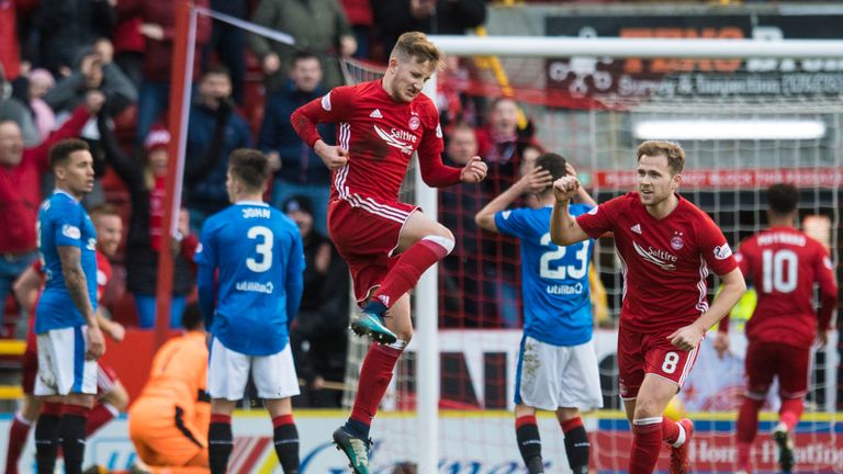 19-year-old Frank Ross celebrates pulling a goal back for Aberdeen against Rangers at the weekend. 
