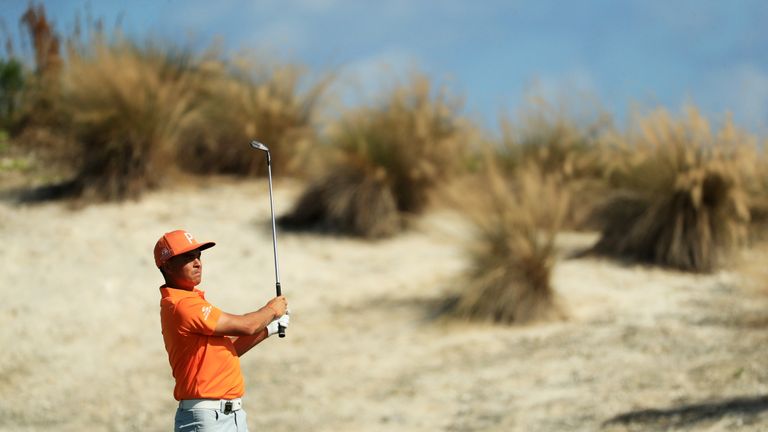 NASSAU, BAHAMAS - DECEMBER 03:  Rickie Fowler of the United States plays a shot on the fourth hole during the final round of the Hero World Challenge at Al