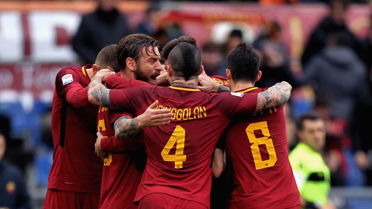ROME, ITALY - DECEMBER 30:  Lorenzo Pellegrini with his teammates of AS Roma celebrates after scoring the opening goal during the serie A match between AS 