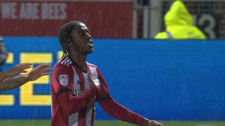 Romaine Sawyer celebrates after scoring the opening goal at Griffin Park