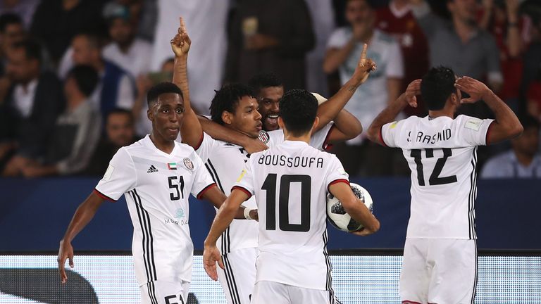 ABU DHABI, UNITED ARAB EMIRATES - DECEMBER 13: Romarinho of Al Jazira celebrates after scoring his sides first goal with his Al Jazira team mates during th