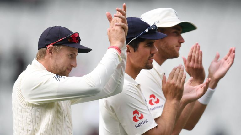 England's Joe Root (L), Alastair Cook (C) and Stuart Broad applaud the England fans on the final day of the fourth Ashes cricket Test match against Austral