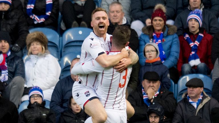County's Craig Curran (left) celebrates his early goal at Ibrox with Jason Naismith