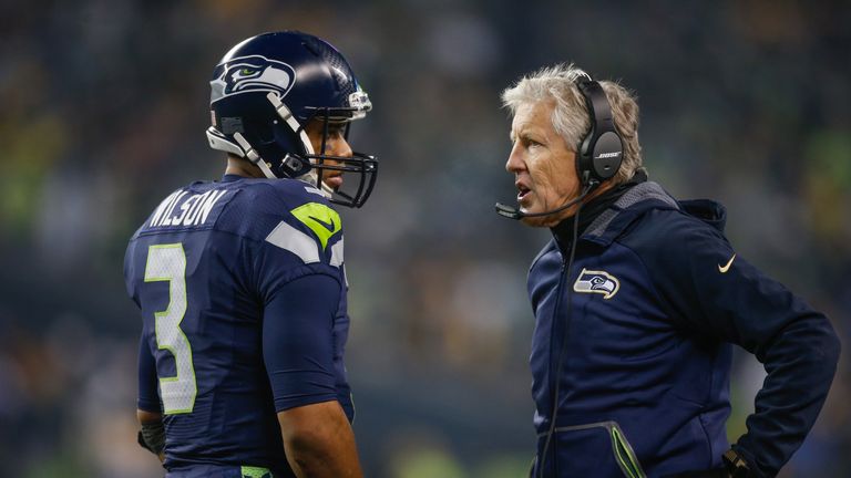 SEATTLE, WA - NOVEMBER 29:  Head coach Pete Carroll of the Seattle Seahawks talks with quarterback Russell Wilson #3 with under two minutes left in the gam