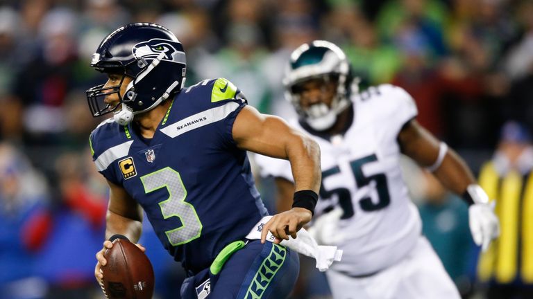 SEATTLE, WA - DECEMBER 03: Quarterback Russell Wilson #3 of the Seattle Seahawks rushes against the Philadelphia Eagles in the third quarter at CenturyLink