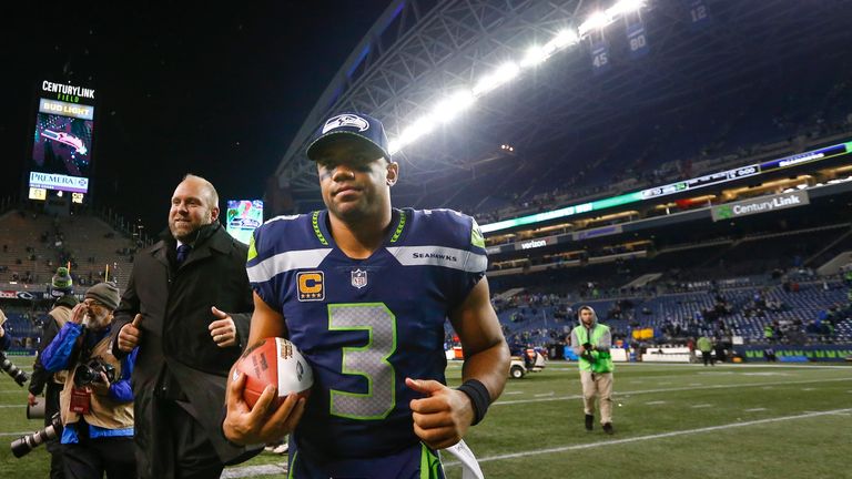 SEATTLE, WA - DECEMBER 03: Russell Wilson #3 of the Seattle Seahawks runs off the field after beating the Philadelphia Eagles at CenturyLink Field on Decem