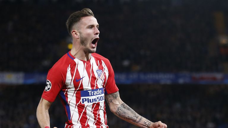 Atletico Madrid's Spanish midfielder Saul Niguez celebrates after scoring during a UEFA Champions League Group C football match between Chelsea and Atletic
