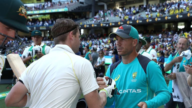 MELBOURNE, AUSTRALIA - DECEMBER 26:  Steve Smith of Australia is congratulated by David Warner of Australia at stumps during day one of the Fourth Test Mat