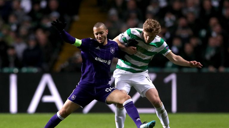 GLASGOW, SCOTLAND - DECEMBER 05:  Sofiane Hanni of RSC Anderlecht is challenged by Stuart Armstrong of Celtic during the UEFA Champions League group B matc