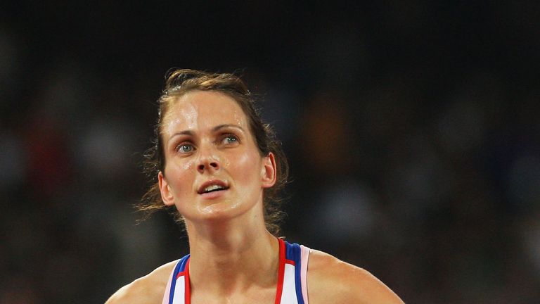 BEIJING - AUGUST 23:  Kelly Sotherton of Great Britain looks up at the scoreboard after competing in the Women's 4 x 400m Relay Final held at the National 