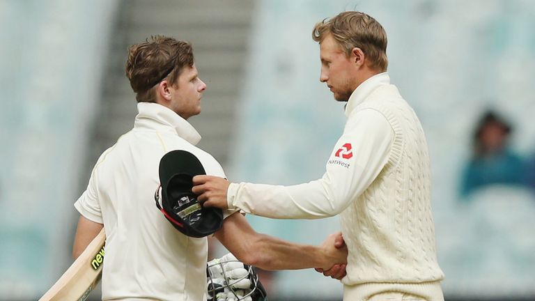Steve Smith of Australia (L) and Joe Root of England shake hands after the drawn result in the Fourth Test