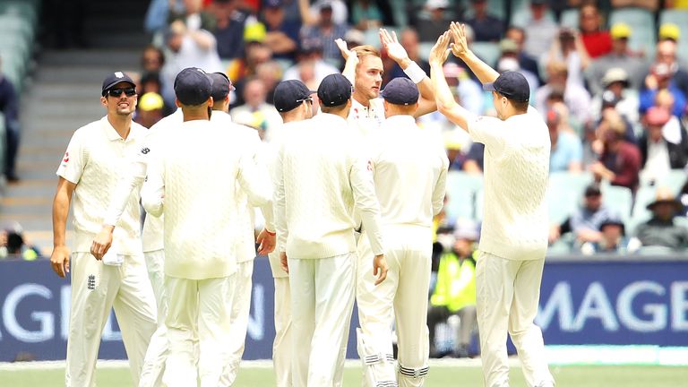 ADELAIDE, AUSTRALIA - DECEMBER 03:  Stuart Broad of England celebrates with his team after taking the wicket of Peter Handscomb of Australia during day two