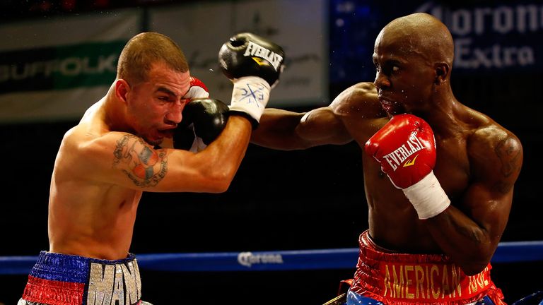 Emmanuel Gonzalez and Tevin Farmer (R) fight during their junior lightweight bout at the House of Blues on June 5, 2014 in Boston.