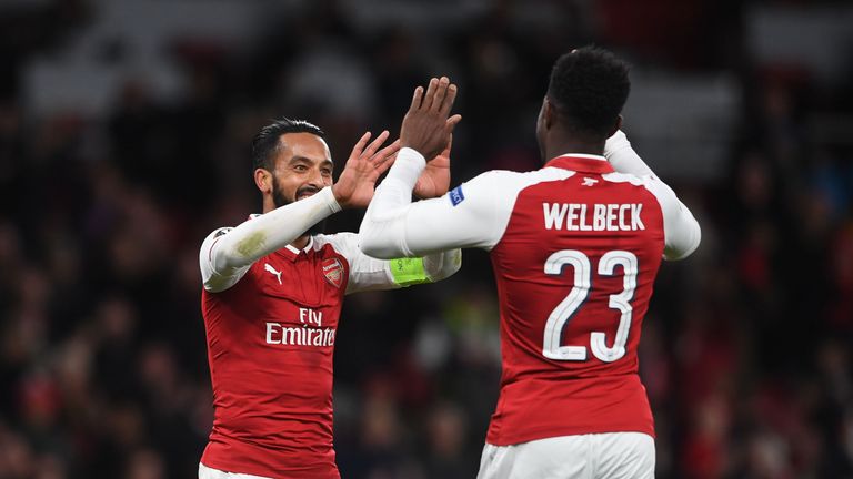 Theo Walcott celebrates with Danny Welbeck against BATE Borisov