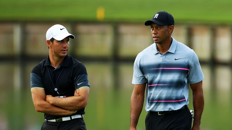 Tiger Woods (right) says he has nothing but respect for Chris Como (left)