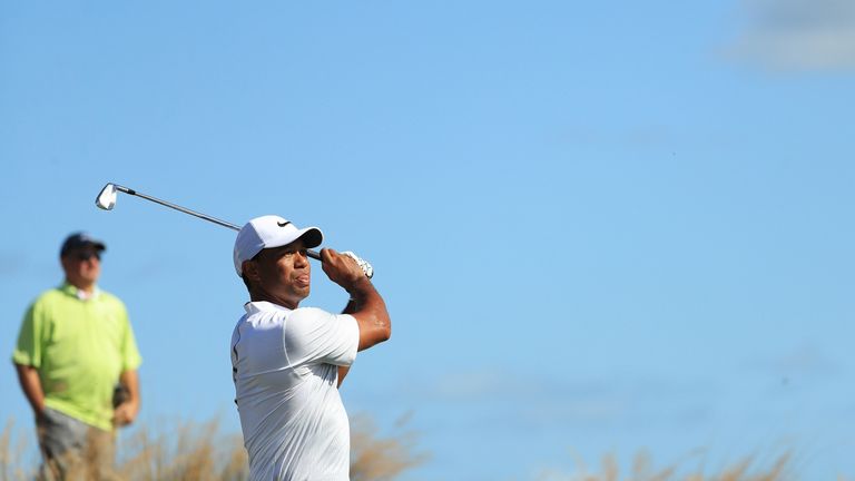 NASSAU, BAHAMAS - DECEMBER 01:  Tiger Woods of the United States plays his shot from the second tee during the second round of the Hero World Challenge at 