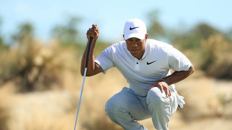 NASSAU, BAHAMAS - DECEMBER 01:  Tiger Woods of the United States lines up a putt on the second green during the second round of the Hero World Challenge at