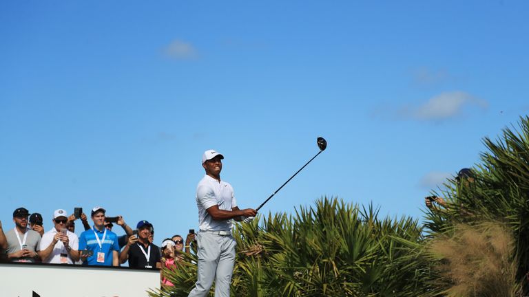 NASSAU, BAHAMAS - DECEMBER 01:  Tiger Woods of the United States plays his shot from the fourth tee during the second round of the Hero World Challenge at 