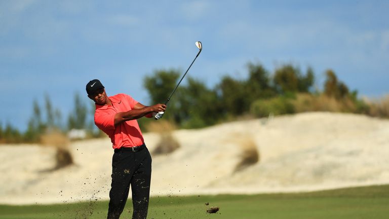 NASSAU, BAHAMAS - DECEMBER 03:  Tiger Woods of the United States plays a shot on the first hole during the final round of the Hero World Challenge at Alban