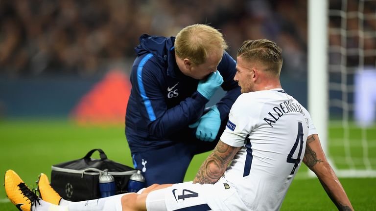 LONDON, ENGLAND - NOVEMBER 01:  Toby Alderweireld of Tottenham Hotspur speaks with medic before leaving the pitch injured during the UEFA Champions League 