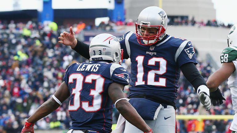 FOXBORO, MA - DECEMBER 31:  Dion Lewis #33 of the New England Patriots celebrates with Tom Brady #12 after scoring a 5-yard receiving touchdown during the 