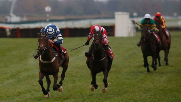 Total Recall ridden by Paul Townend (right) trail Whisper ridden by Davy Russel up the home straight before going on to win The Ladbrokes Trophy Race run d