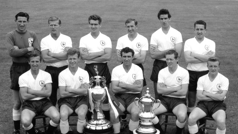 1961:  The 'double' winning Tottenham Hotspur team with the league championship and FA Cup trophies to prove it. From left to right in the back row - Brown