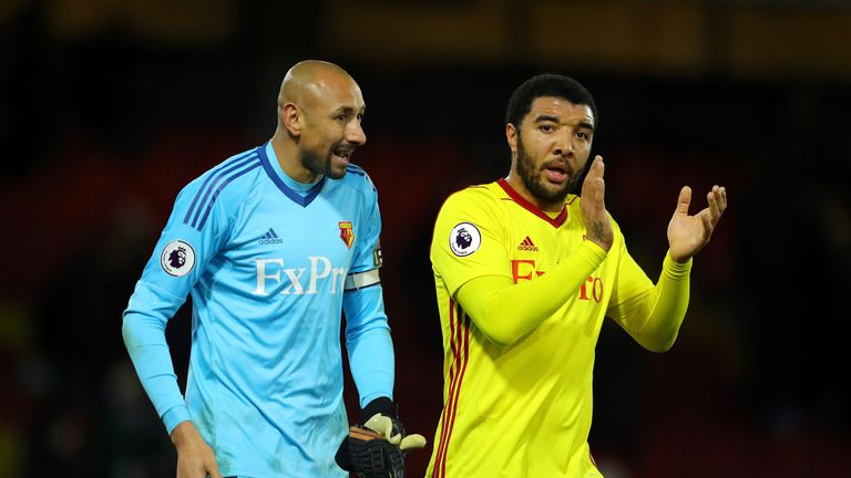 WATFORD, ENGLAND - NOVEMBER 28: Heurelho Gomes and Troy Deeney of Watford aaplude the fans at the final whistle during the Premier League match between Wat