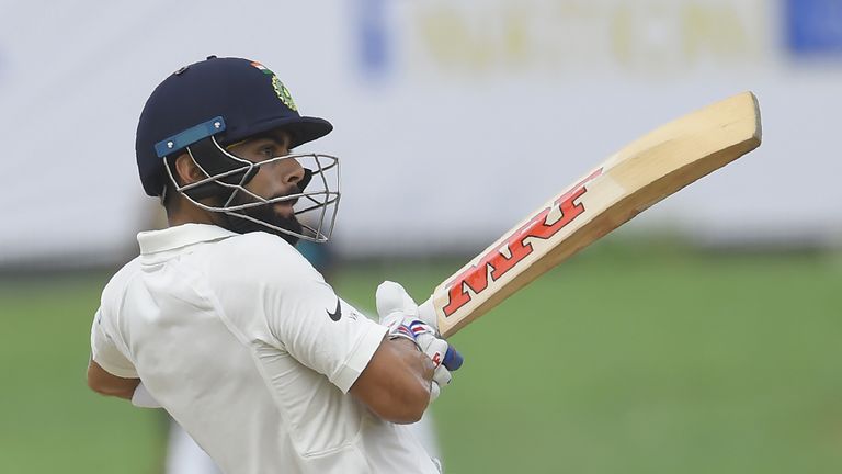 Indian cricket team captain Virat Kohli plays a shot during the fourth day of the first Test match between Sri Lanka and India at Galle International Crick