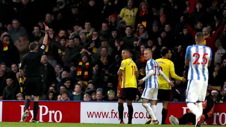 WATFORD, ENGLAND - DECEMBER 16:  Troy Deeney of Watford  is shown a red card by referee Michael Oliver during the Premier League match between Watford and 