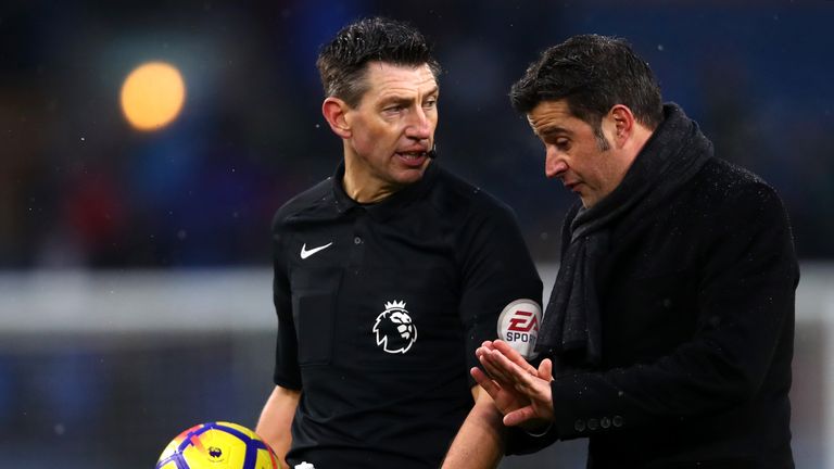 BURNLEY, ENGLAND - DECEMBER 09:  Marco Silva, Manager of Watford confronts referee Lee Probert at half time during the Premier League match between Burnley