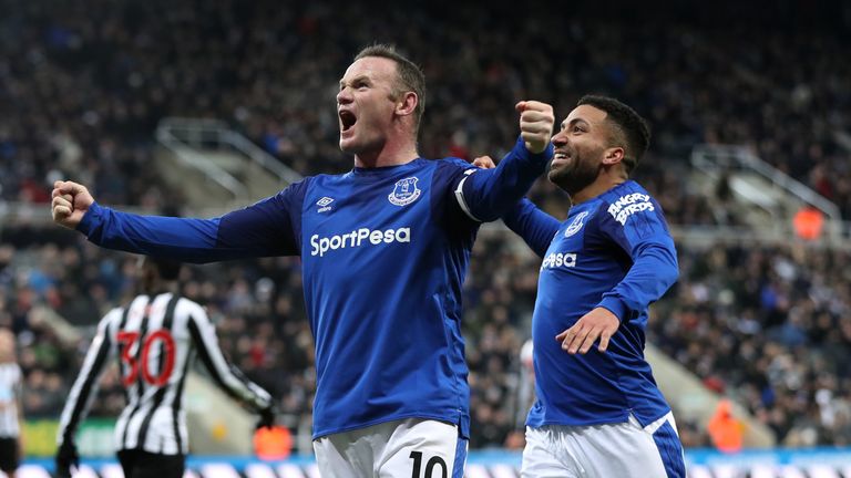 NEWCASTLE UPON TYNE, ENGLAND - DECEMBER 13: Wayne Rooney of Everton celebrates after scoring his sides first goal with Aaron Lennon of Everton during the P