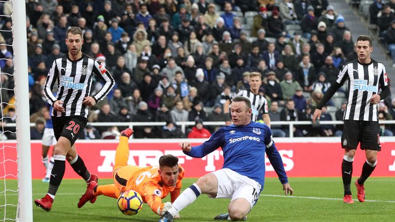Wayne Rooney of Everton scores his side's first goal past Karl Darlow of Newcastle United