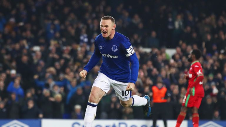 LIVERPOOL, ENGLAND - DECEMBER 18:  Wayne Rooney of Everton celebrates as he scores their third goal from the penalty spot during the Premier League match b