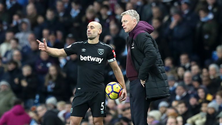 West Ham United's Pablo Zabaleta (left) talks to manager David Moyes on the touchline during the Premier League match at Manchester City