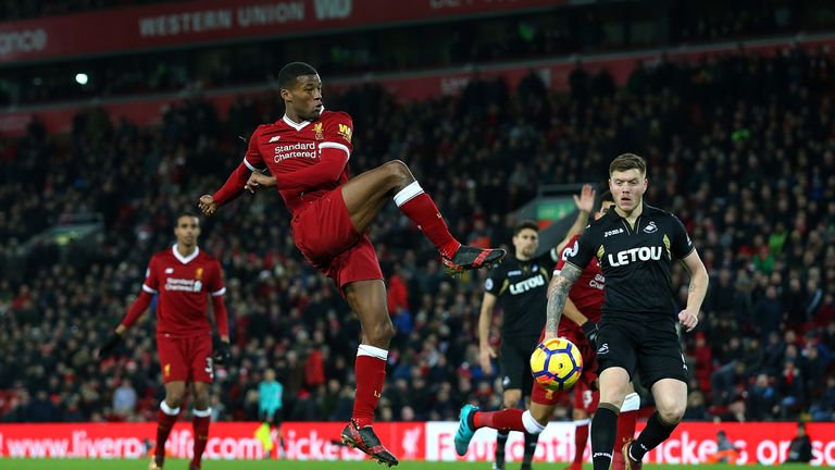 LIVERPOOL, ENGLAND - DECEMBER 26:  Georginio Wijnaldum of Liverpool shoot at goal during the Premier League match between Liverpool and Swansea City at Anf