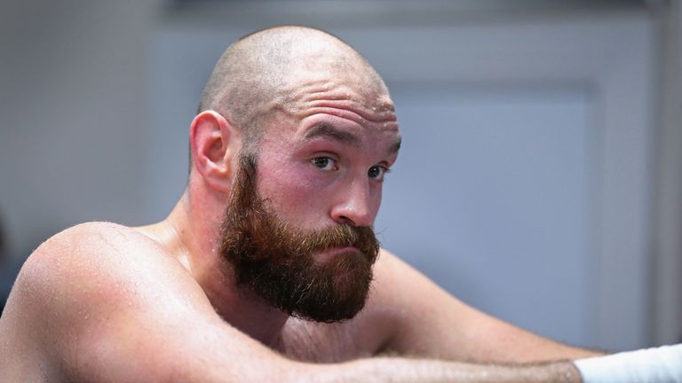 BOLTON, ENGLAND - NOVEMBER 06:  Tyson Fury looks on during a training session at Team Fury Gym ahead of his fight with Dereck Chisora on November 6, 2014 i