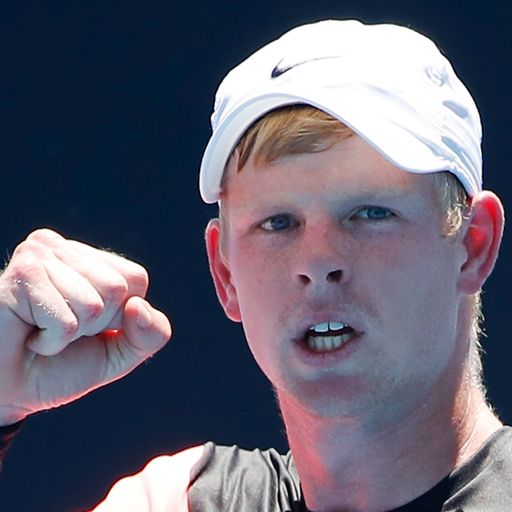 Edmund battles heat to reach last 16