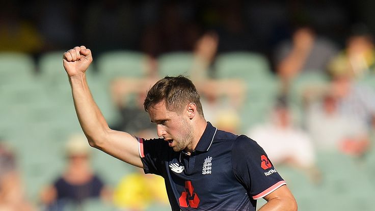 Chris Woakes celebrates after dismissing David Warner