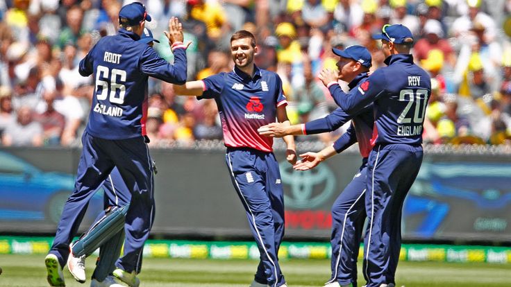 Mark Wood of England celebrates after dismissing David Warner of Australia during game one of the One Day International